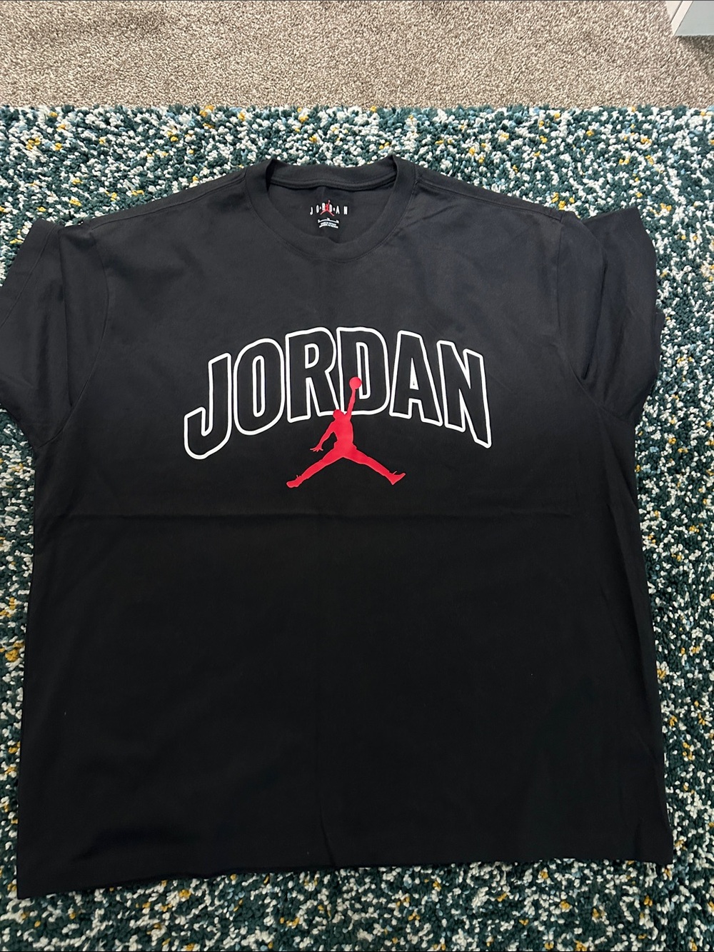 Jordan Black Short Sleeve Tee with Red Jumpman and White Outline Logo